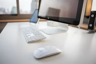 A home office with a desktop computer