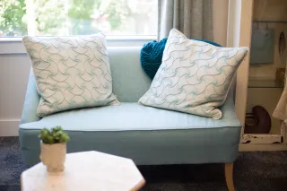 A sofa in a furnished room