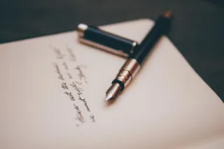 Writing with a pen to compare information